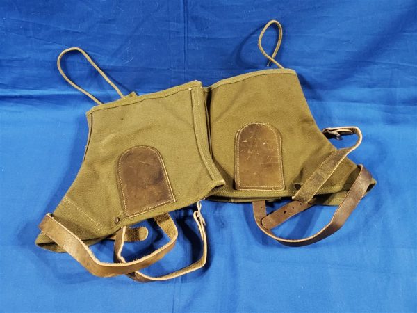 pair-of-late-war-mountain-troop-ski-legging-1945-dated-with-the-leather-straps-and-in-great-condition