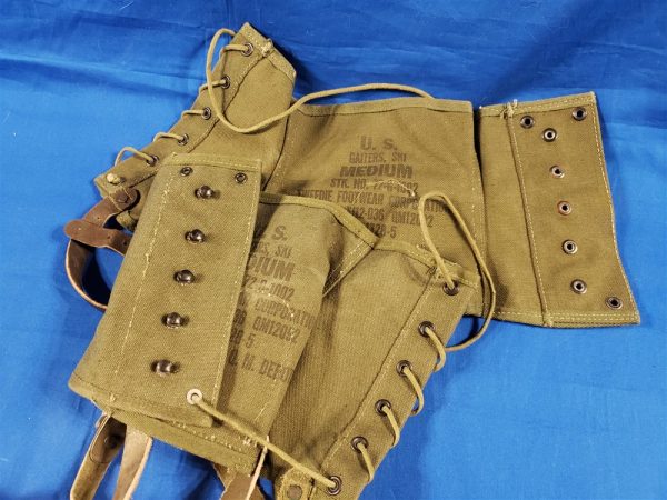 pair-of-late-war-mountain-troop-ski-legging-1945-dated-with-the-leather-straps-and-in-great-condition