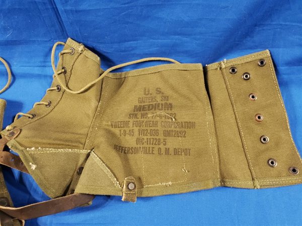 pair-of-late-war-mountain-troop-ski-legging-1945-dated-with-the-leather-straps-and-in-great-condition