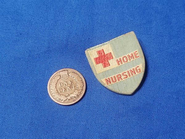 red-cross-nurse-home-care-world-war-two-pin-back-cloth-on-plastic