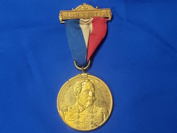 gar-32nd-encamp-medal GAR 32nd Encamp 1898 souvenir with Admiral Dewey on Front. This is a excellent medal with the original gilding on the planchet and the top bar, ribbon in good condition and in 1898 they decided to place admiral Dewey on the front