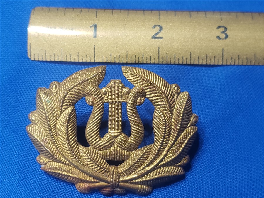 m6538アメリカ 1874年 ナイツ・オブ・パイシアス アンティーク バッジ m1897-musician-cap-badge-size.jpg