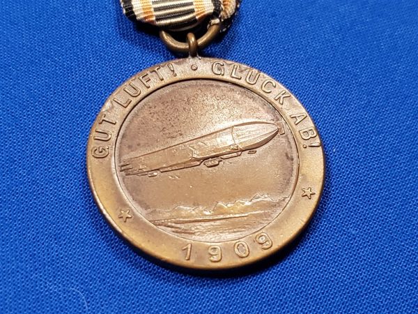 german-graf-zeppelin-medal-1909-with-original-ribbon-and-scene-of-airship-on-back