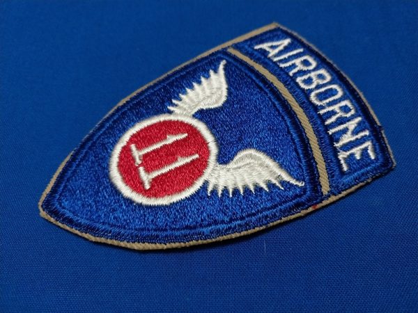 patch-with-attached-tab-air-born-on-tan-twill-unissued-condition
