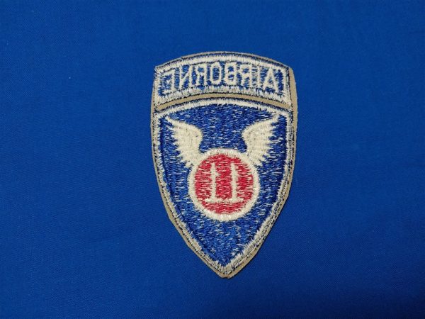 patch-with-attached-tab-air-born-on-tan-twill-unissued-condition