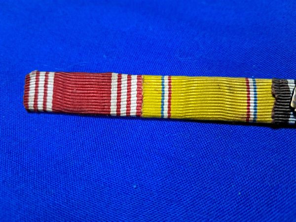 world-war-two-ribbon-bar-3-places-with-good-conduct-american-defense-and-european-theater-with-arrow-and-5-battle-stars