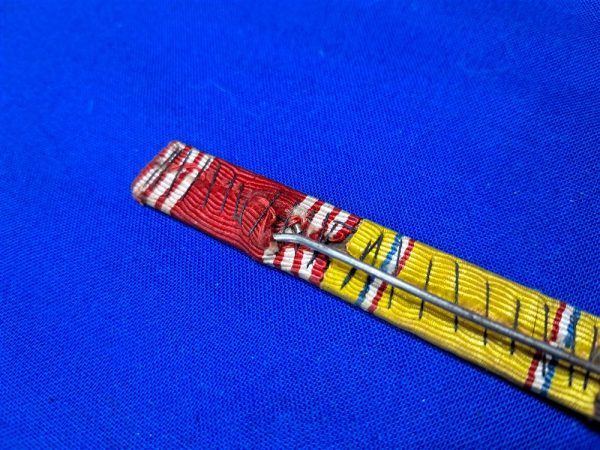 world-war-two-ribbon-bar-3-places-with-good-conduct-american-defense-and-european-theater-with-arrow-and-5-battle-stars