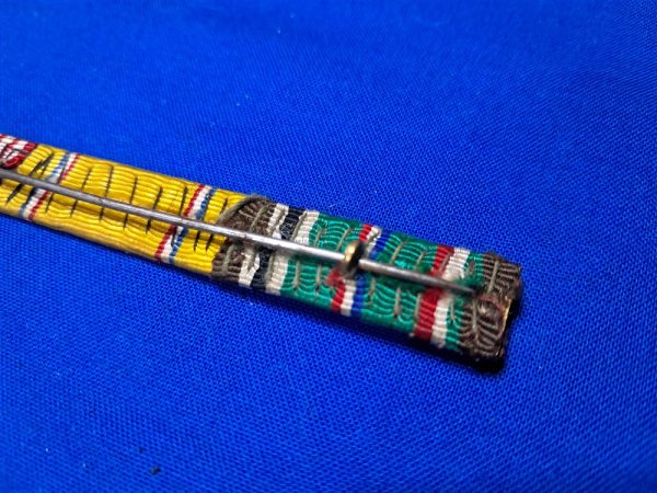 world-war-two-ribbon-bar-3-places-with-good-conduct-american-defense-and-european-theater-with-arrow-and-5-battle-stars