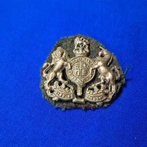 world-war-one-british-cap-badge-sleeve-unassigned-enlisted-man-brass-with-wool-backing