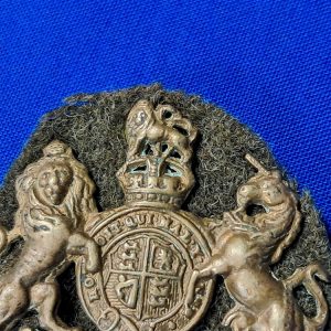 world-war-one-british-cap-badge-sleeve-unassigned-enlisted-man-brass-with-wool-backing