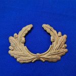 world-war-two-german-visor-cap-wreath-for-veterans-association-gold-color-with-4-prongs