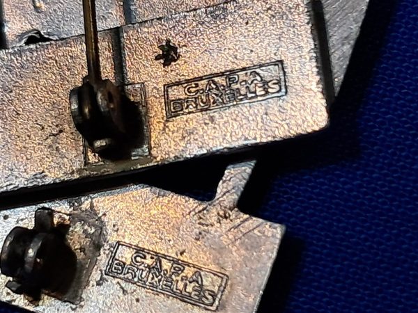 world-war-two-rank-insignia-captin-made-in-brussels-occupation-period-plated-brass-marked