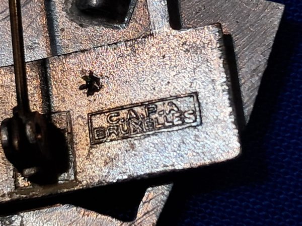 world-war-two-rank-insignia-captin-made-in-brussels-occupation-period-plated-brass-marked