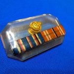 world-war-two-paper-weight-plastic-small-clear-with-awards-inside