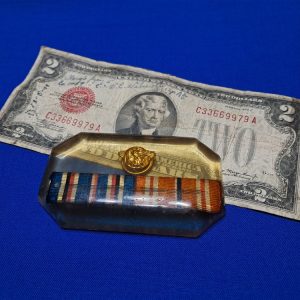 world-war-two-paper-weight-plastic-small-clear-with-awards-inside