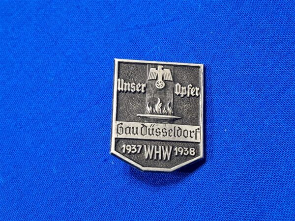 whw-1937-dusseldorf german-world-war-two-tinnie-for-the-whw-donation-drives-for-the-year-1937-38-aluminum-original-pin