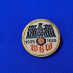 world-war-two-german-whw-donation-pin-for-the-year-35-1936-cloth-bevo-woven-metal-frame