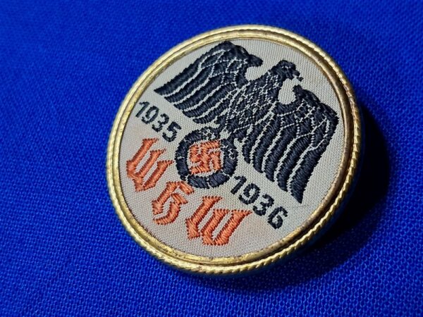 world-war-two-german-whw-donation-pin-for-the-year-35-1936-cloth-bevo-woven-metal-frame