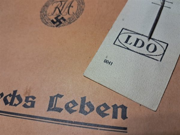 world-war-two-german-youths-sports-badge-stick-pin-in-silver-for-wear-book-contains-document