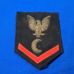 world-war-two-naval-chevron-petty-officer-3rd-class-in-dress-bullion-with-silver-eagle-and-red-felt-stripe