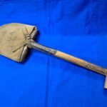 world-war-two-shovel-m-1910-pattern-early-with-used-cover-1943-dated-t-handle-type