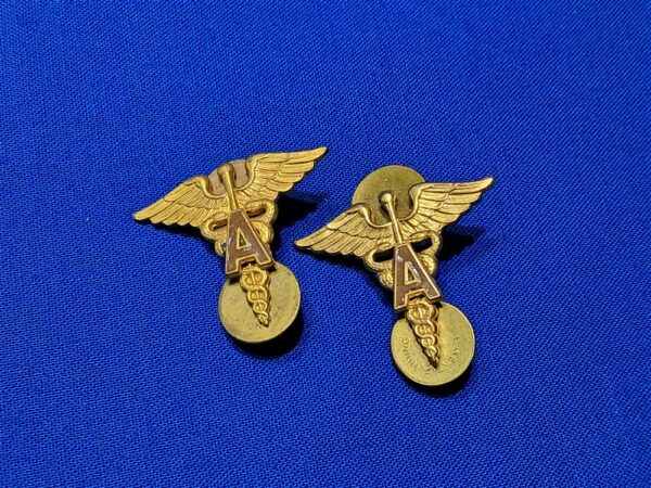 world-war-two-medical-officers-insignia-with-a-applied-in-brown-enemel-matched-set-unmarked