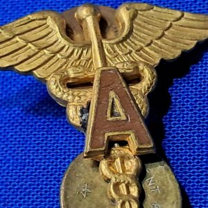 world-war-two-medical-officers-insignia-with-a-applied-in-brown-enemel-matched-set-unmarked