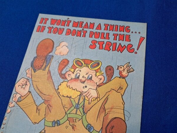 world-war-two-postcard-airborne-soldier-falling-through-the-clouds-told-to-pull-the-string-in-color