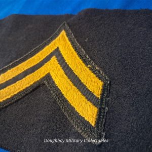 korean-war-era-arm-insignia-for-acting-corporal-blue-felt-with-cut-edge-rank