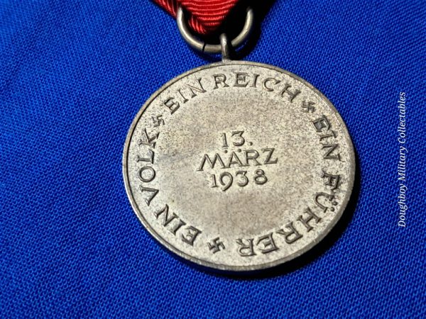 german-world-war-two-anschluss-occupy-austria-medal-dated-1938-with-original-ribbon-no-clasp