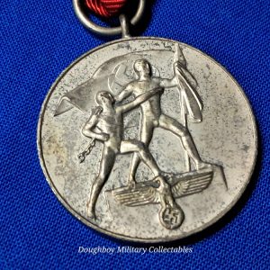german-world-war-two-anschluss-occupy-austria-medal-dated-1938-with-original-ribbon-no-clasp