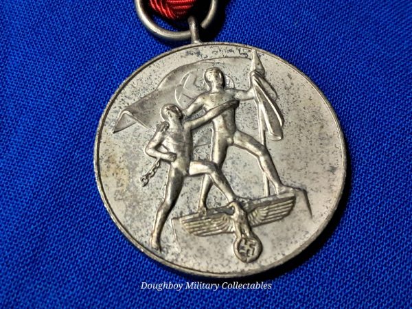 german-world-war-two-anschluss-occupy-austria-medal-dated-1938-with-original-ribbon-no-clasp