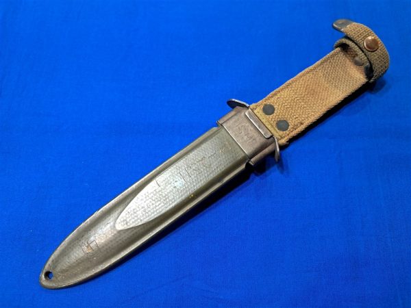 m8-scabbard-wwii origianal-world-war-two-scabbard-for-fighting-knife-number-on-body-early-light-khacki-color-early webbing weave