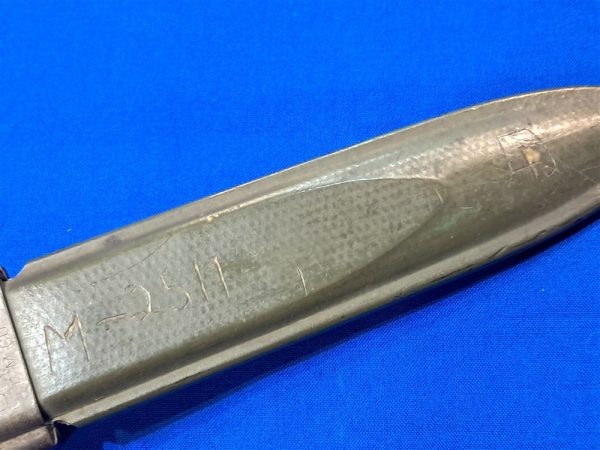 origianal-world-war-two-scabbard-for-fighting-knife-number-on-body-early-light-khacki-color-early webbing weave
