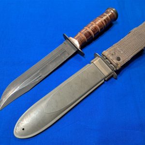 original-world-war-two-mark-2-naval-fighting-knife-by-camillus-unissued-condition-leather-handle-with-sheath-fiber-construction