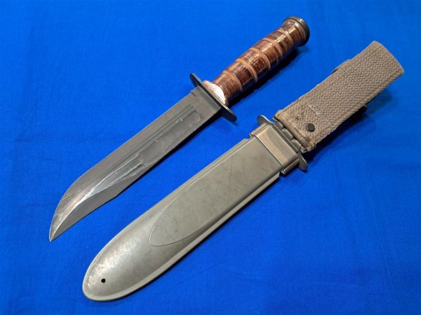 original-world-war-two-mark-2-naval-fighting-knife-by-camillus-unissued-condition-leather-handle-with-sheath-fiber-construction